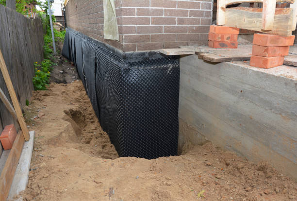Happy homeowners after waterproofing job in Montgomery Village